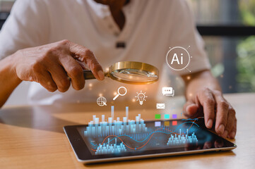 Senior man holding a magnifying glass using digital tablet with ai icon and data charts representing ideas and innovative in elderly and technology lifestyle, using artificial intelligence by elderly