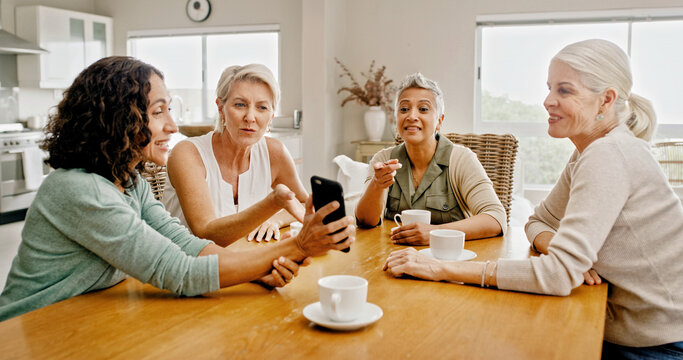 Mature women, friends and phone at house for social media, browsing website and reading gossip. Group, people and mobile for celebrity news, review post and message notification at reunion gathering