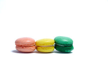 Obraz premium Different color of macarons in isolated white background