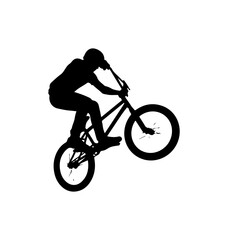 Obraz premium Mountain Biker Performing a Jump