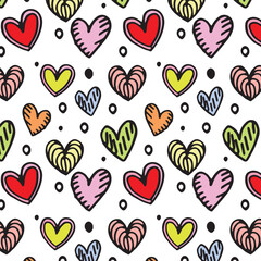 Seamless vector pattern with colorful doodle hearts. 