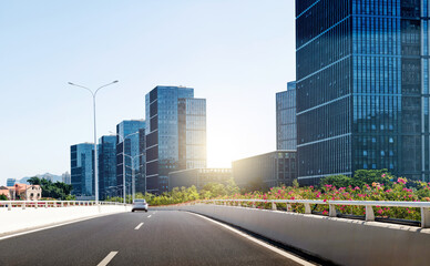 Fototapeta premium Highway overpass near office buildings
