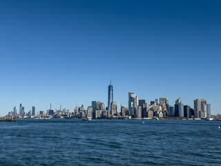 Obraz premium Lower Manhattan Skyline with One World Trade Center Across New York Harbor
