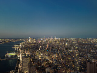 Obraz premium Aerial Night View of Midtown Manhattan Skyline with City Lights