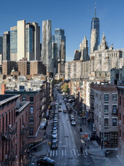 Fototapeta premium New York, Manhattan - USA 10.26.2024: Lower Manhattan Street View with One World Trade Center and Downtown Skyline, New York City