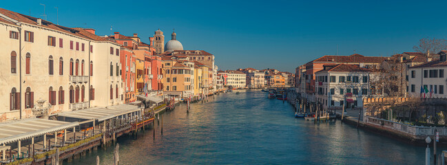 Naklejka premium Panoramic view of Venice, ancient palazzos, houses, and canals, Italy
