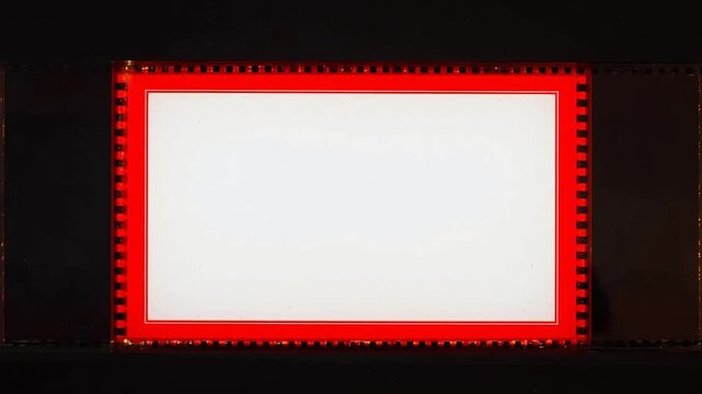 Film strip with red border and blank frame