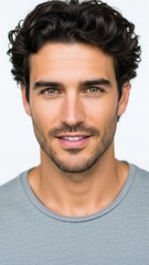 Obraz premium Man Smiling With Curly Hair Gray Shirt