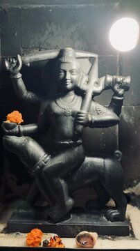 Kaal Bhairav captured inside a dimly lit temple sanctum, emphasizing power, protection, and fierce divinity.