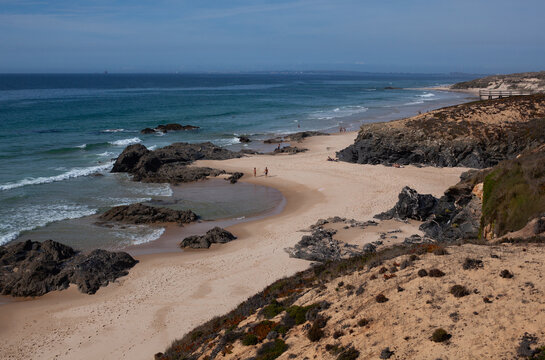 Aerial view of tourists on Malhão Beach in Portugal