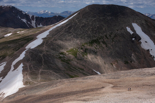 Hikers approaching the summit of Mt Sherman trail near Leadville, CO
