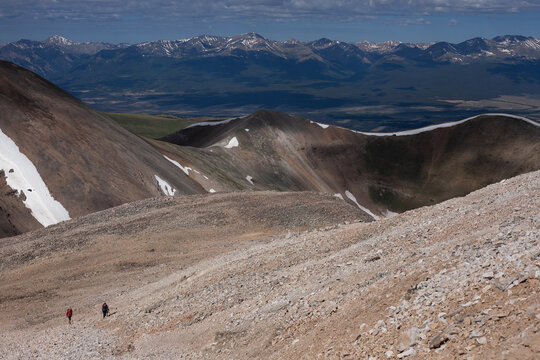 Hikers approaching the summit of Mt Sherman trail near Leadville, CO