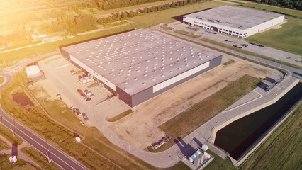 Drone view of warehouse using water reservoir for heat exchange system