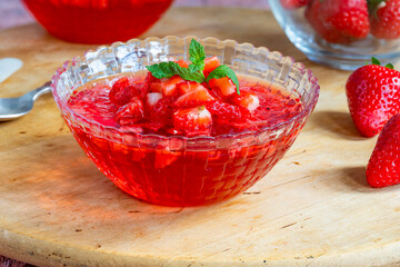 Homemade fruit jelly with fresh strawberries
