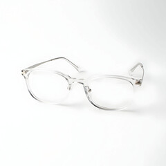 A pair of eyeglasses with transparent frames and silver temples