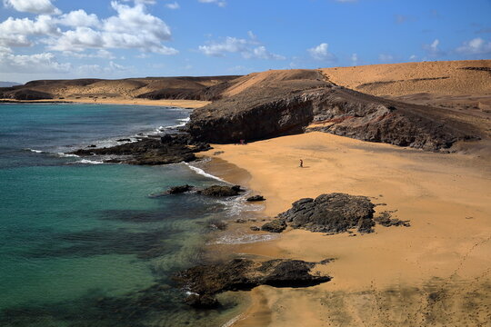 Memos beach and Caleta del Congrio beach, two beaches located close to Papagayo beach in Los Ajaches Park in Lanzarote, Canary Islands, Spain, a sandy beach surrounded by a volcanic landscape