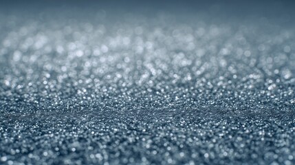 Obraz premium Macro photo of frozen icy surface covered with tiny glitter-like crystals. Winter frost, cold weather, natural pattern, sparkling texture, abstract detail, magical atmosphere.