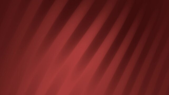 Blurred diagonal lines on a gradient red background create a dynamic and modern design perfect for abstract backgrounds or digital presentations.