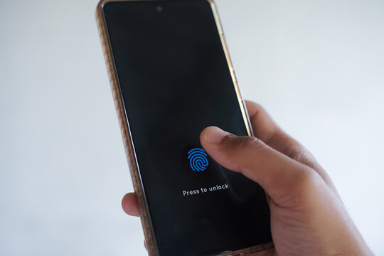 Hand Unlocking Smartphone with Fingerprint Biometric Security