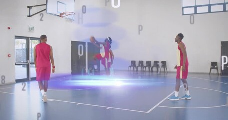 Basketball players shifting after pass, practicing drive while floating letters or numbers overlayin