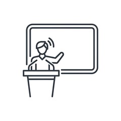 Speaker at a podium in front of a whiteboard, delivering a presentation or lecture.