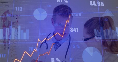 Doctor holding spine model and pointing at bar charts and line graphs for clinical data review - Powered by Adobe