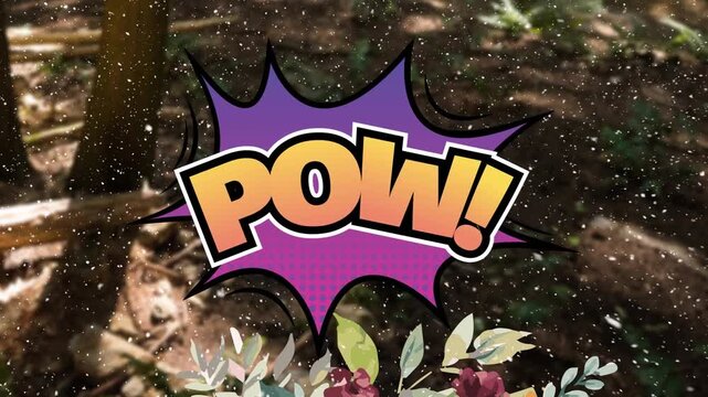 Animation of pow text and snow falling over landscape