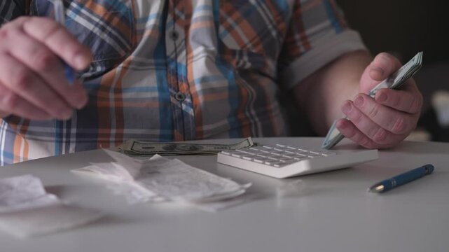 Person Carefully Handling Documents, Individual Diligently Organizing Financial Records, Person Methodically Reviewing And Organizing Financial Documents On Bright Sunny Day