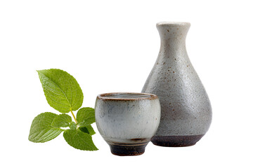 Japanese Sake Ceramic Bottle and Cup with Fresh Green Leaves