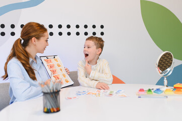 Speech therapist assisting child with articulation exercises
