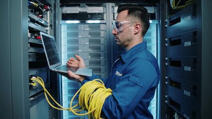 IT engineer man working in data server center using laptop - Technology concept - Model by AI generative - Powered by Adobe