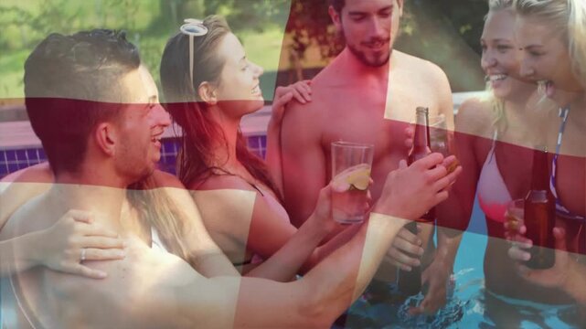 Group of friends enjoying drinks by pool with flag overlay animation