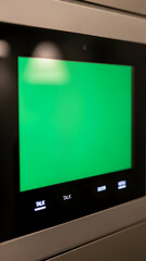 Elevator Display Screen with Green Background.