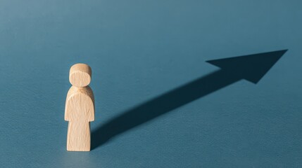 Wooden figure casting growth arrow shadow a motivational perspective on potential in minimalist space