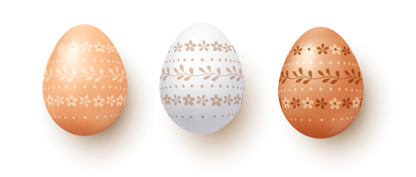 Three realistic Easter eggs with delicate floral and dotted ornaments in warm pastel tones, isolated on white background for holiday designs, cards, packaging and seasonal decorations.