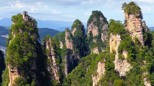 Aerial shot of the majestic sandstone pillars of Zhangjiajie National Forest Park in Hunan China.