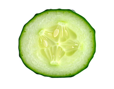 Close-up of a single, vibrant green cucumber slice showing internal details
