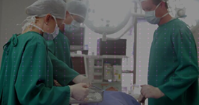 Surgeons performing operation with heart rate animation over medical equipment