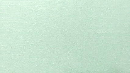 Light Mint Green Textured Wall Background With Smooth Plaster Surface
