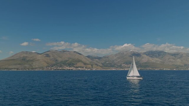 Sailboat Sailing In The Sea In Gaeta, Italy - Drone Shot