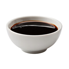 Dark liquid in a round, white bowl, against a stark black background