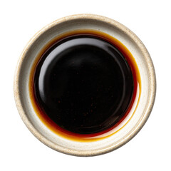 Dark liquid in a small, beige ceramic bowl, centered on a black backdrop