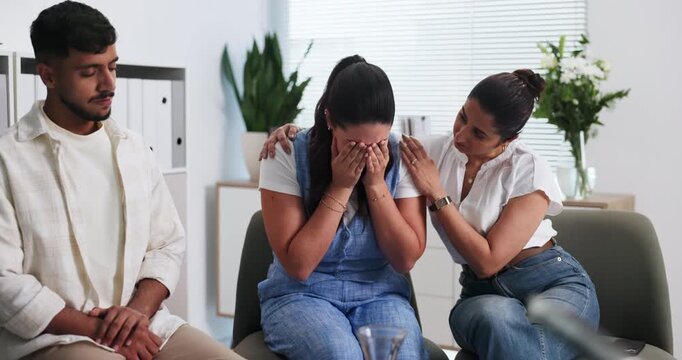 Sad, woman and group therapy for counseling session, employee conflict and staff resolution. People, talking or comfort person for work dispute, interpersonal issues and emotional breakdown in office