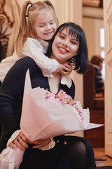 bouquet of flowers mom daughter and grandma family women's party in a cafe, Greetings to the family