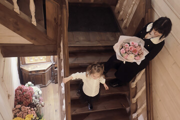 bouquet of flowers mom daughter and grandma family women's party in a cafe, Greetings to the family