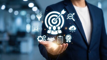 Businessman holding digital marketing and strategy icons,customer target and analytics concept,technology in business operations