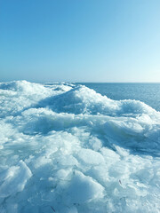 Frozen ice on a sea background