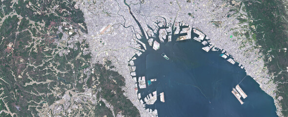 Naklejka premium Osaka Bay and Coastal Urban Area in Japan Viewed from Space – Ports, Industry and Coastline in Satellite Imagery