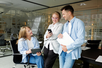 Group business people of coworkers discussing ideas in an office