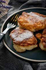 Homemade pancakes on a wooden table.